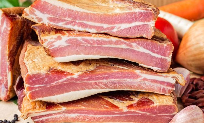 A pile of bacon. The Keto Diet calls for consuming lots of high-fat, low-protein, low-carb foods like this.